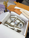 Women’s low-top sneakers by Louis Vuitton, white leather with olive monogram panels