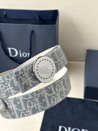 Dior monogram belt with round pale buckle on blue patterned strap