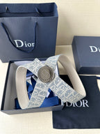 Dior monogram belt with round buckle and blue patterned strap, logo plate