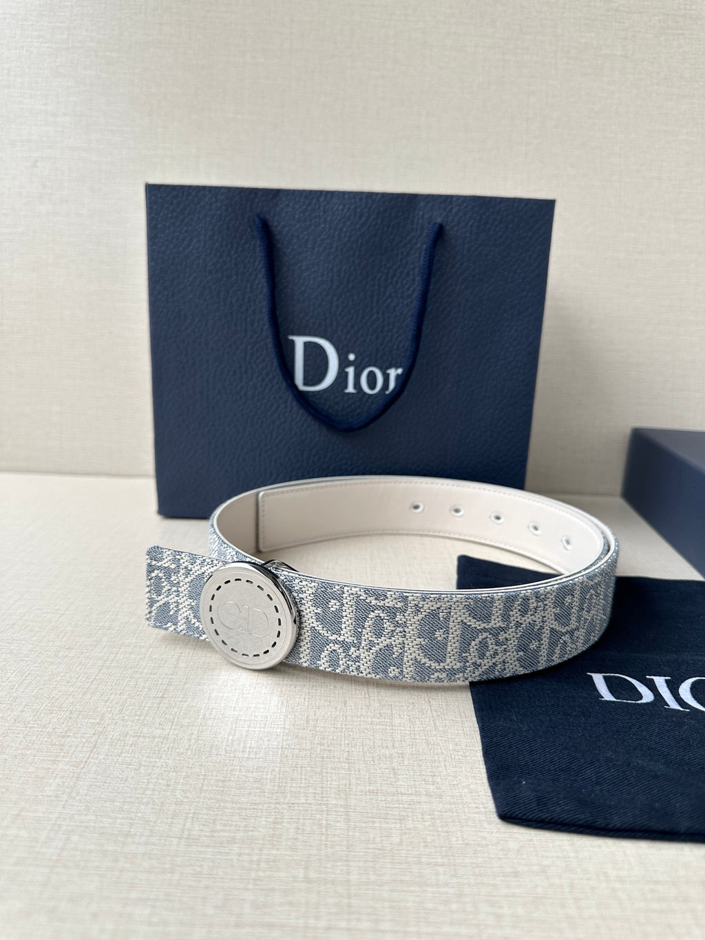 Dior monogram belt with light logo buckle on blue patterned strap