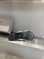 Balenciaga sandal outsole with black rubber tread, shown from underside view.