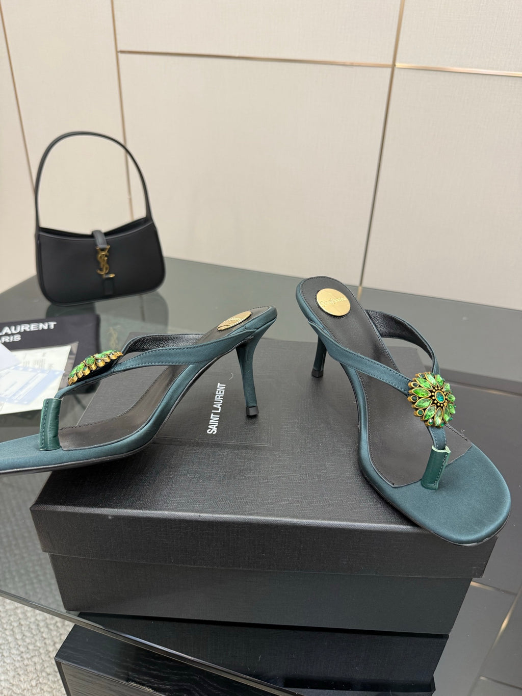 Women's teal heeled thong sandals with jeweled floral embellishment on strap