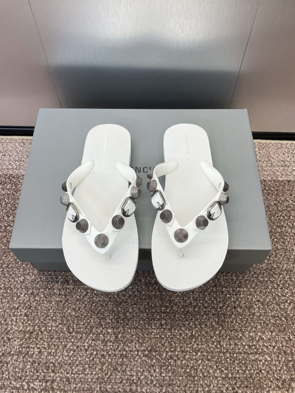 White thong sandals with studded fabric straps and silver-tone hardware