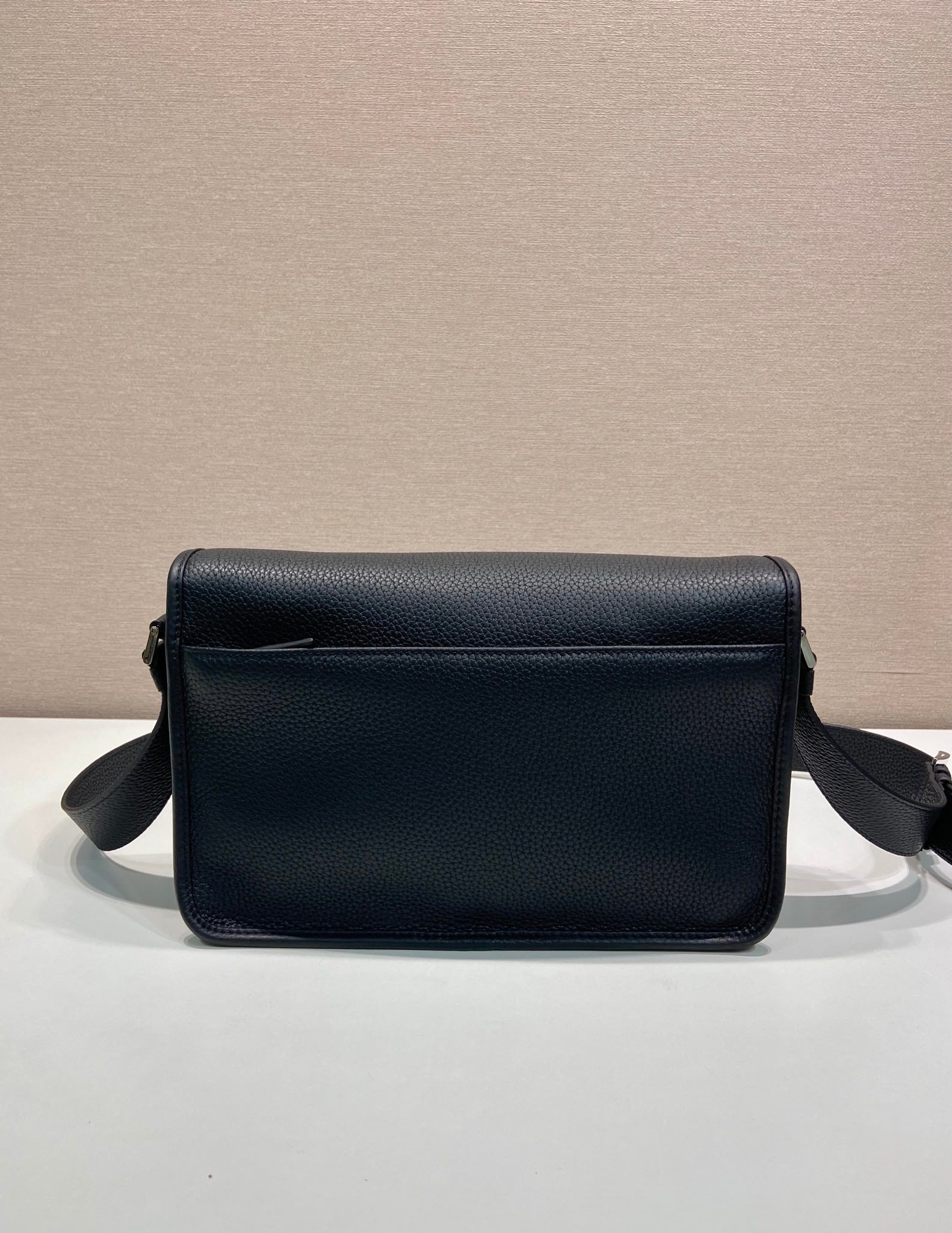 Prada leather crossbody bag, black, front flap with triangle logo and short strap