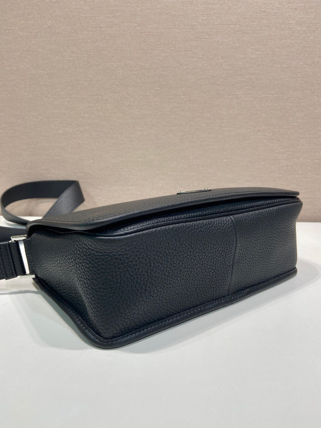 Prada leather crossbody bag back, black, with adjustable strap and stitched seams