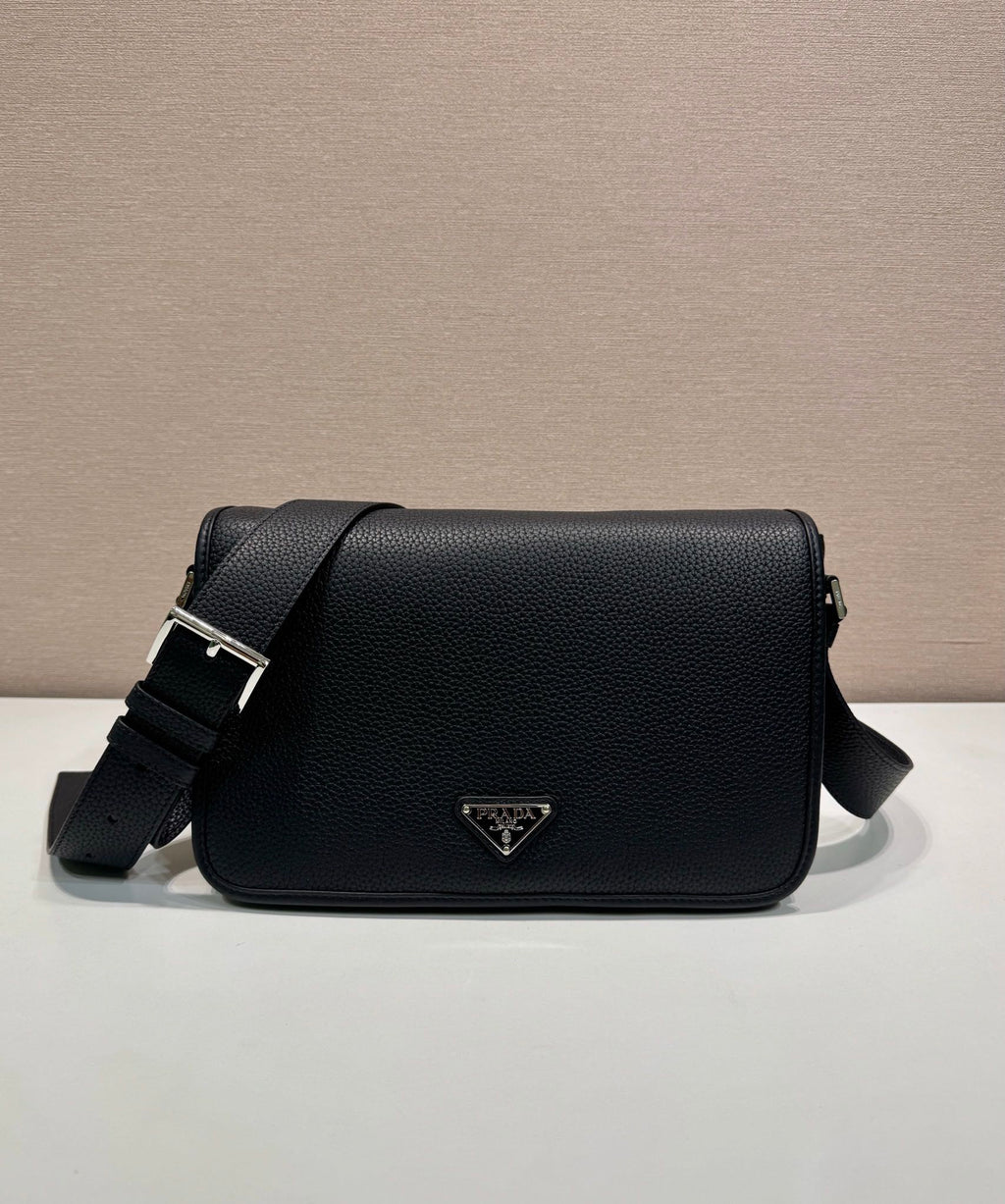 Prada leather crossbody bag with flap and silver triangle logo, black
