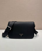 Prada leather crossbody bag with flap and silver triangle logo, black