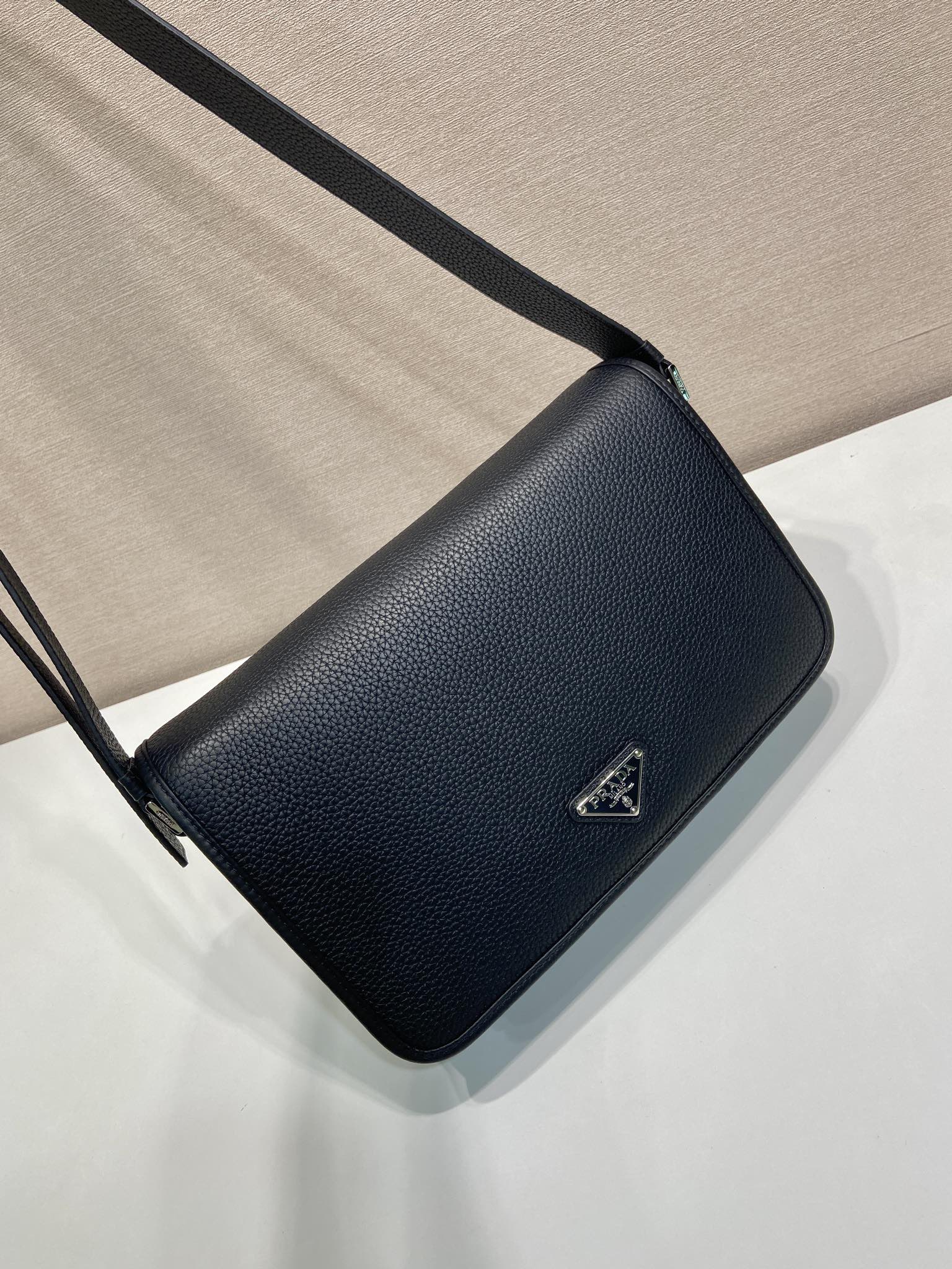 Prada leather crossbody bag with flap, black, adjustable strap, triangle logo