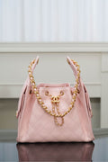 Chanel pink quilted shoulder bag with gold chain strap and front logo hardware