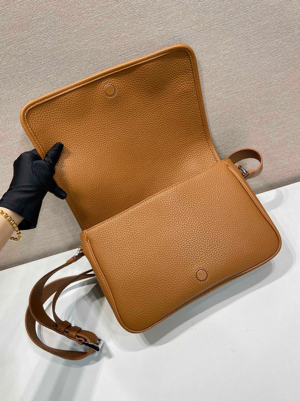 Prada leather crossbody bag, open flap with front pocket and adjustable strap