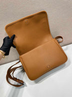 Prada leather crossbody bag, open flap with front pocket and adjustable strap