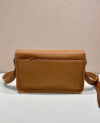 Prada leather crossbody bag with top flap, brown pebbled leather and shoulder strap