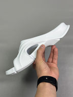 Balenciaga white slide sandals, top view showing open toe and molded strap