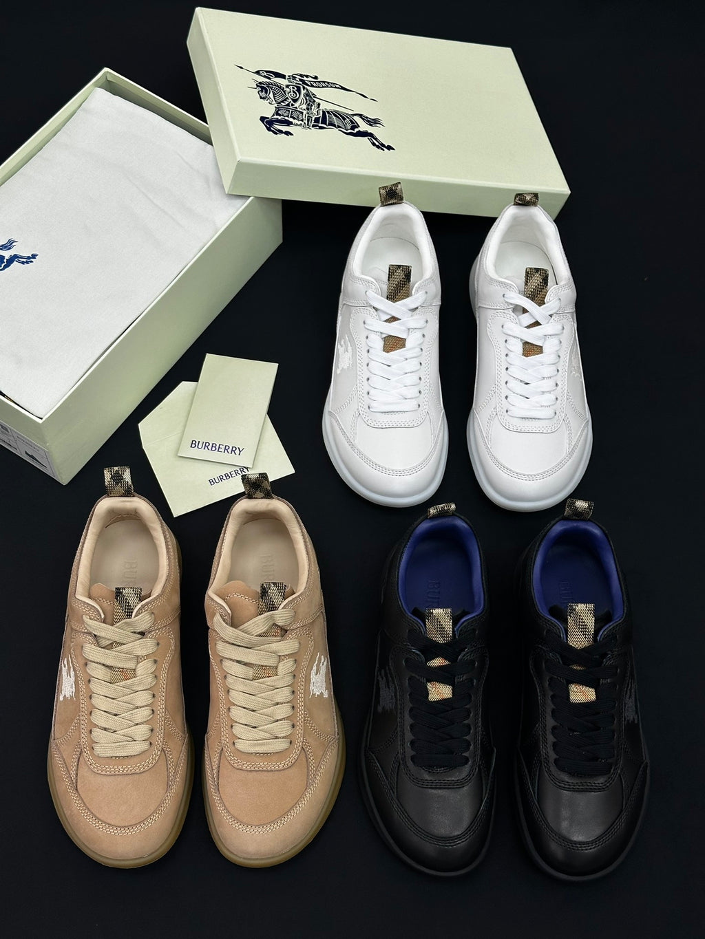Burberry shoes set with white, tan, black, and navy sneakers with laces