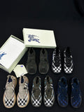 Set of Burberry slip-on sneakers in dark tones, plaid and solid uppers