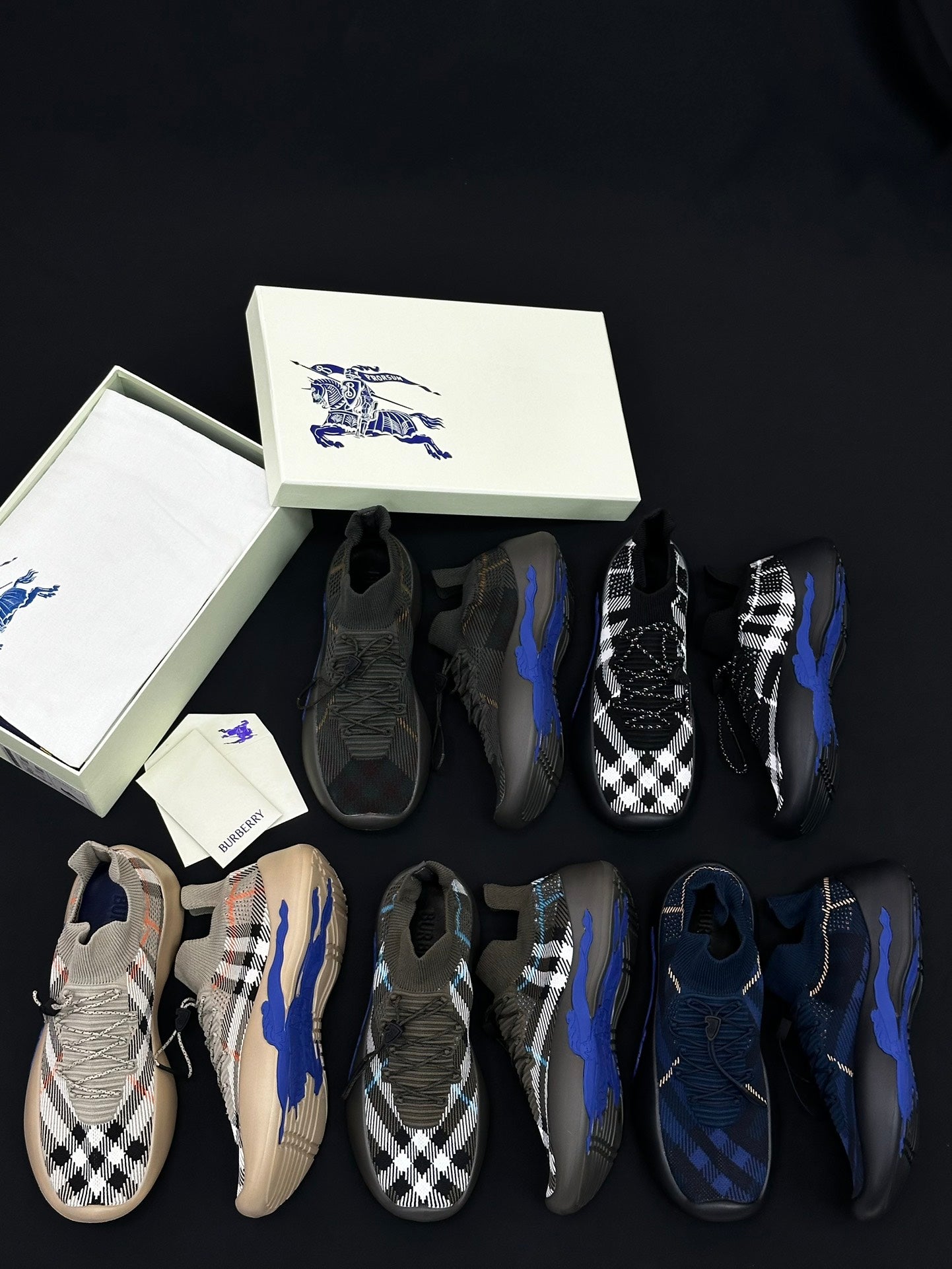 Set of Burberry slip-on sneakers with plaid and solid uppers, dark and blue