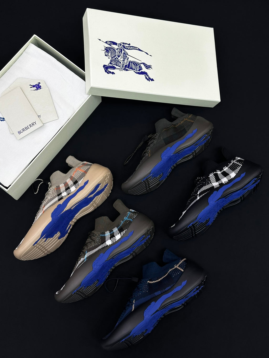 Burberry slip-on sneakers, beige and black with blue accents and plaid details