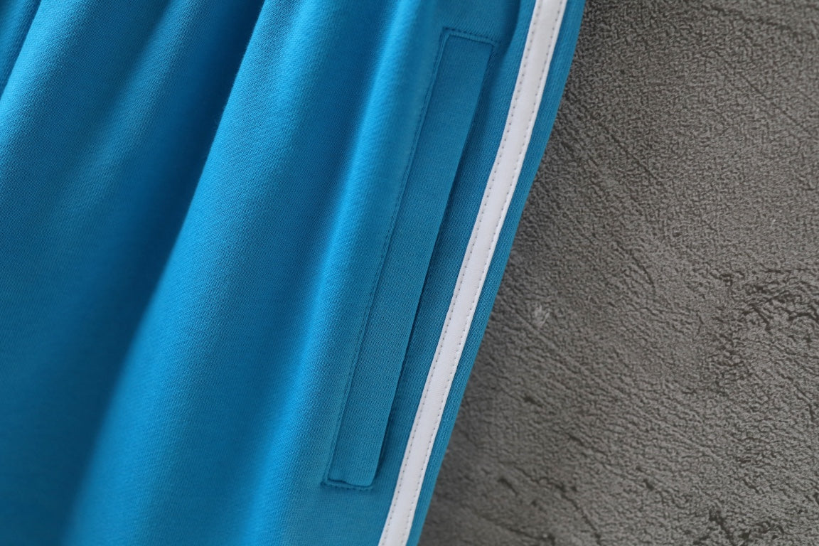 Balenciaga blue shorts with side panel stripe and stitched pocket opening