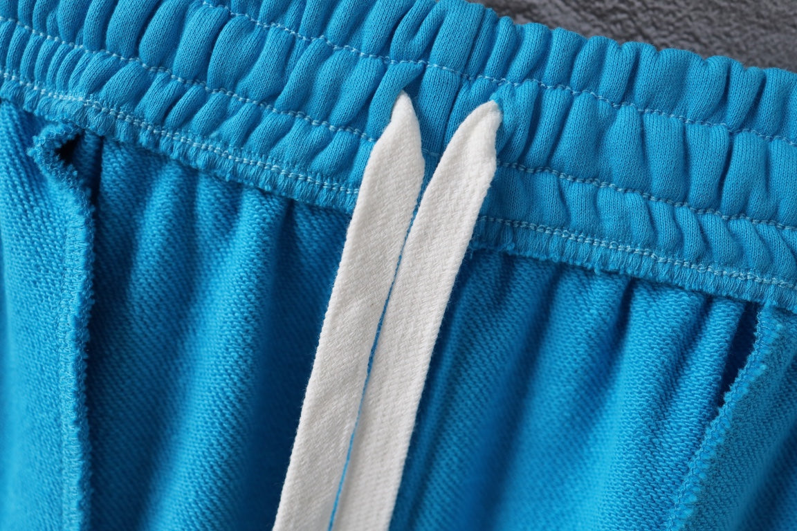 Balenciaga blue shorts with elastic waist and white drawcord