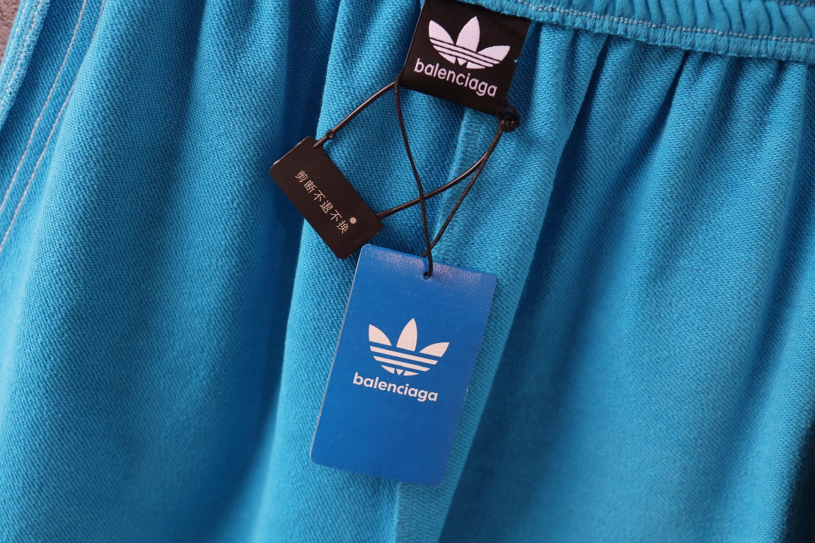 Balenciaga blue shorts with elastic waist and hanging brand tags