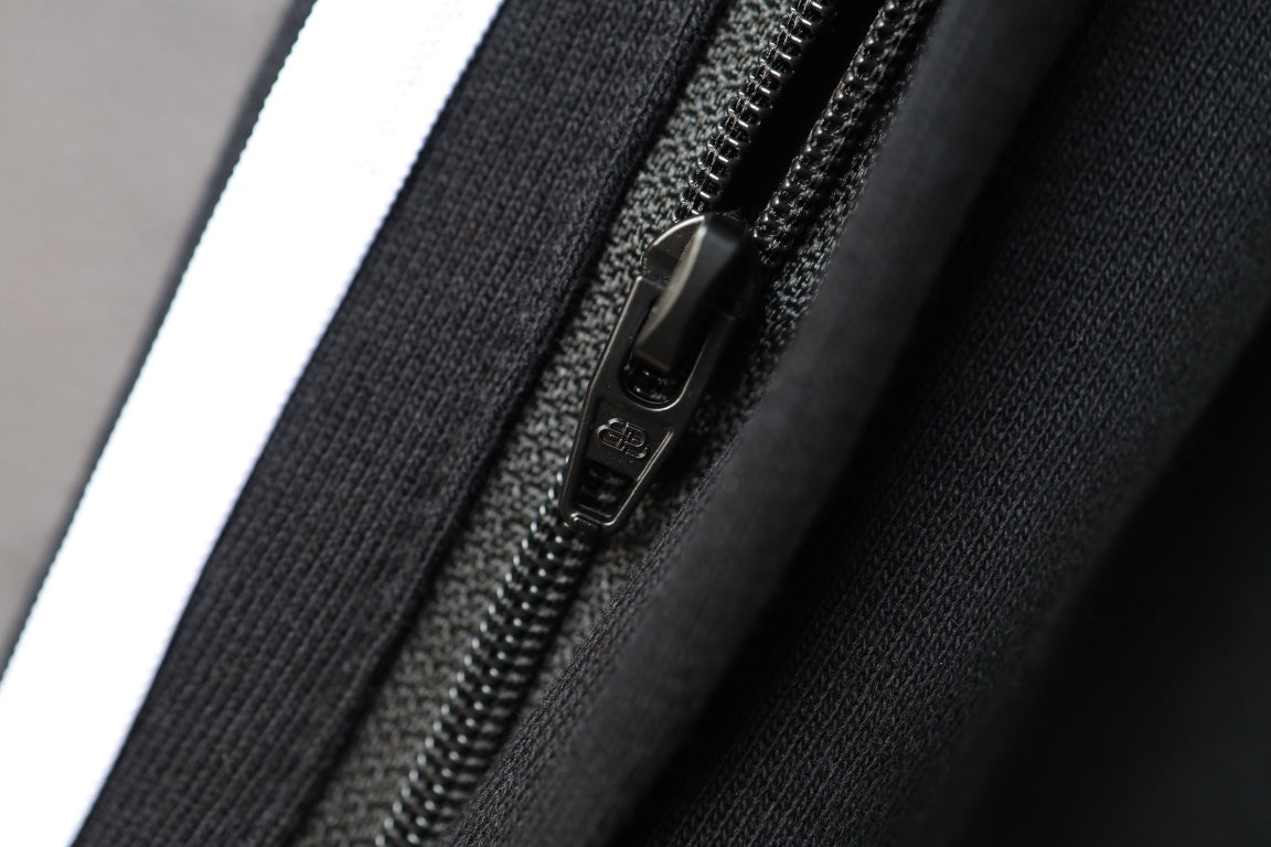 Black shorts with zip fly and contrast white stripe along seam