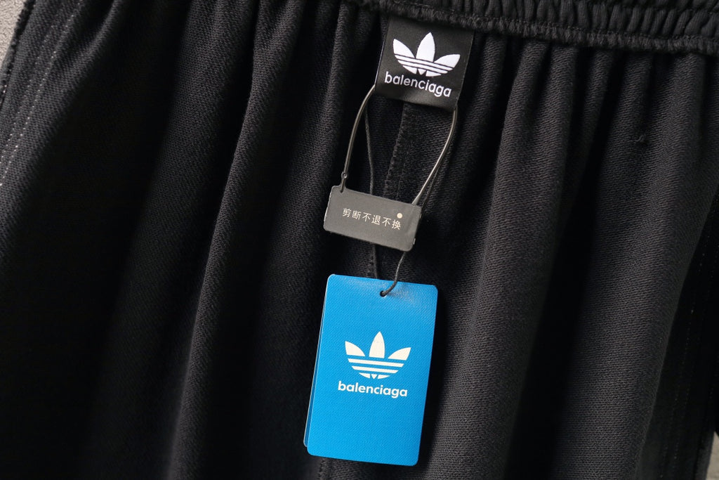 Balenciaga shorts with hang tags featuring balenciaga logo on blue label