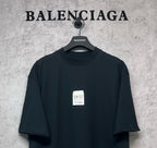 Balenciaga crew-neck short-sleeve T-shirt, dark, chest label 520 visible