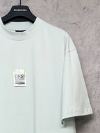 Balenciaga short-sleeve T-shirt on hanger with crew neck and front size label