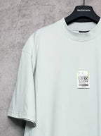 Balenciaga short-sleeve T-shirt angled view with crew neck and front size label