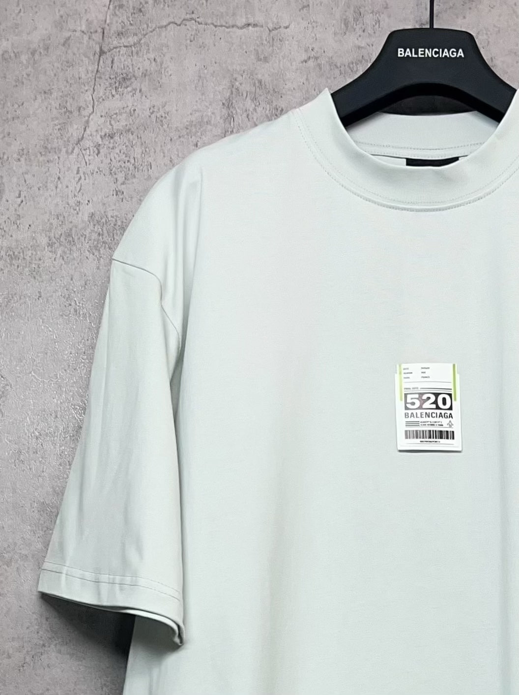 Balenciaga short-sleeve T-shirt angled view with crew neck and front size label