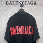 Black Balenciaga T-shirt with red back graphic logo print, short sleeves.