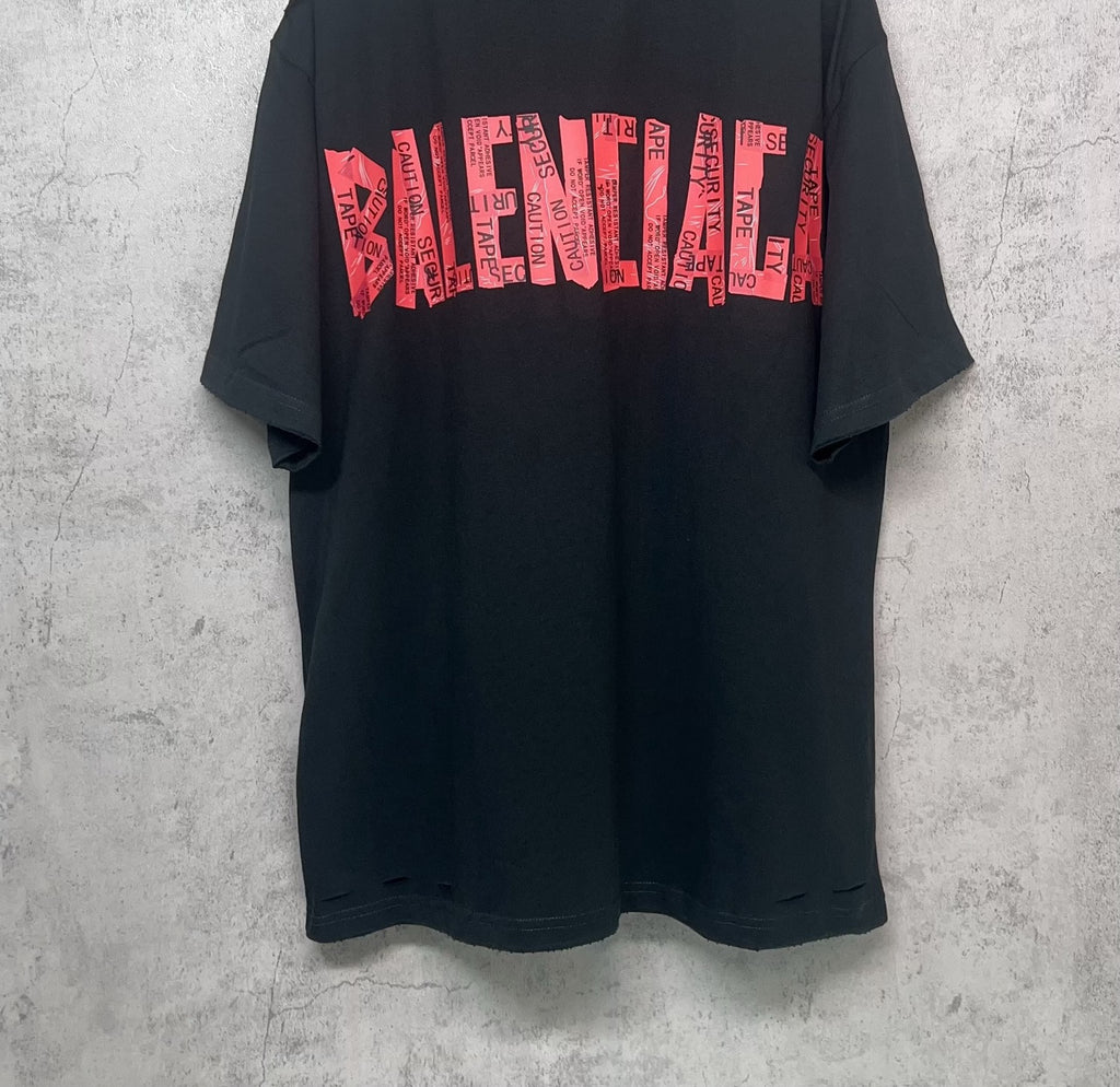 Black Balenciaga T-shirt back view with red graphic logo print, short sleeves.