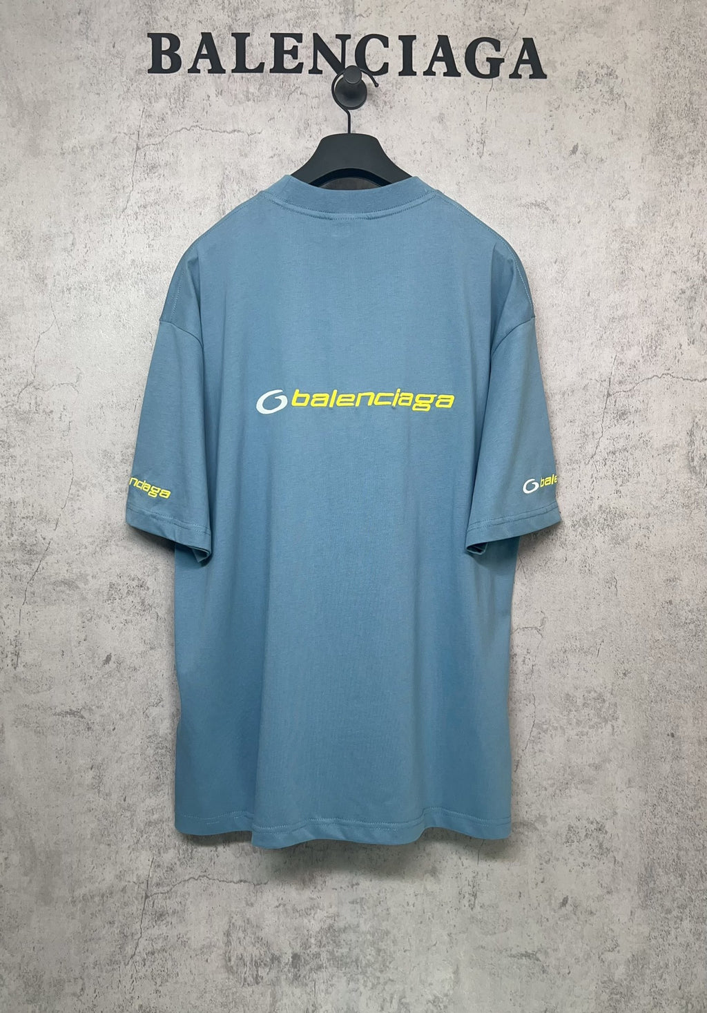 Blue Balenciaga T-shirt, back view with logo print and short sleeves