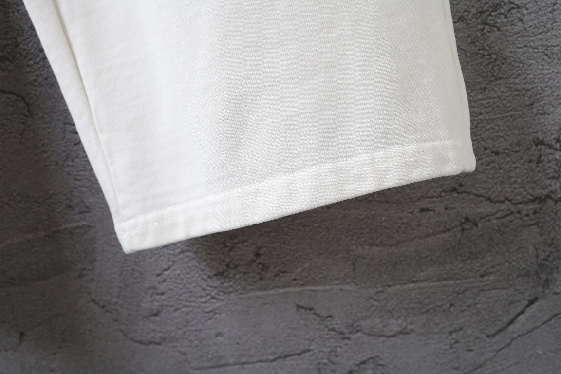 White pants hem cuff with a clean stitched edge