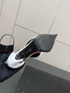 Louis Vuitton women's ankle boot sole view with black heel and logo markings