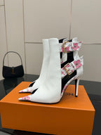 Louis Vuitton women's white ankle boots with pink floral straps and gold buckle detail