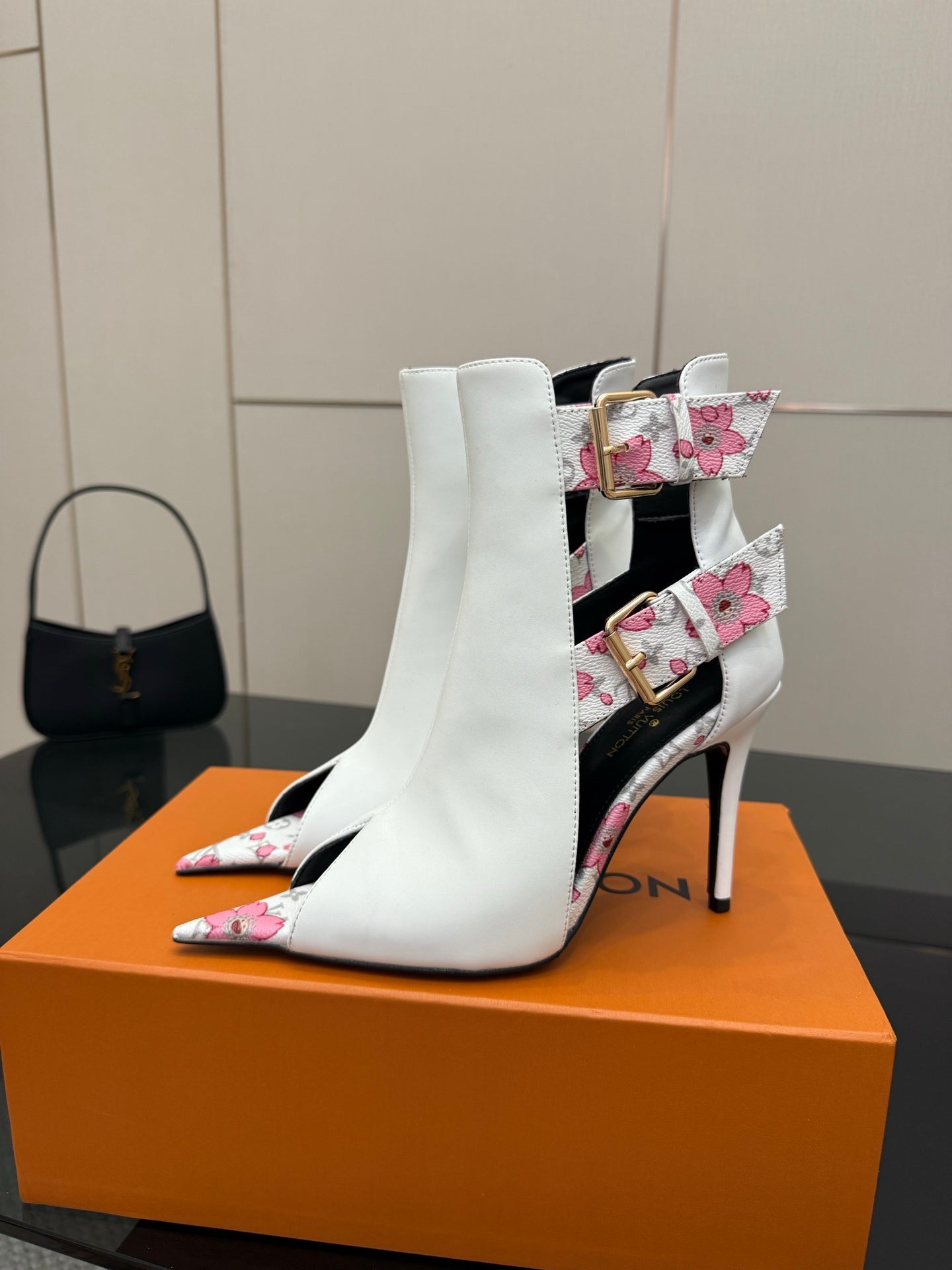 Louis Vuitton women's white ankle boots with pink floral straps and gold buckle detail