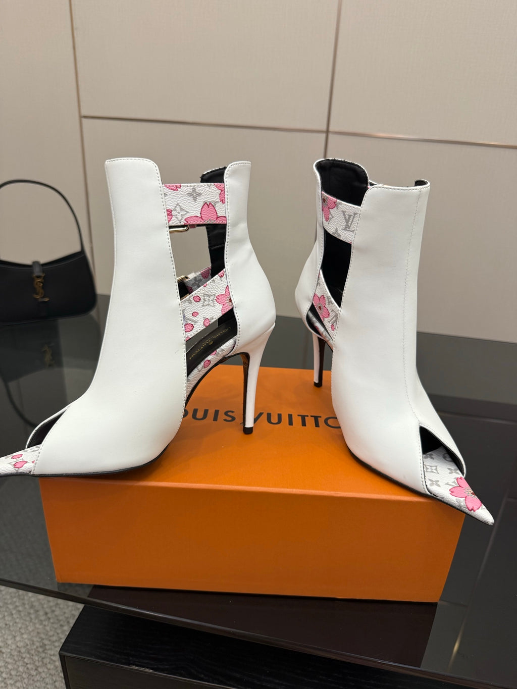 Louis Vuitton women's white ankle boots with floral side panels and stiletto heel