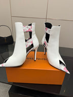 Louis Vuitton women's white ankle boots with floral side panels and stiletto heel