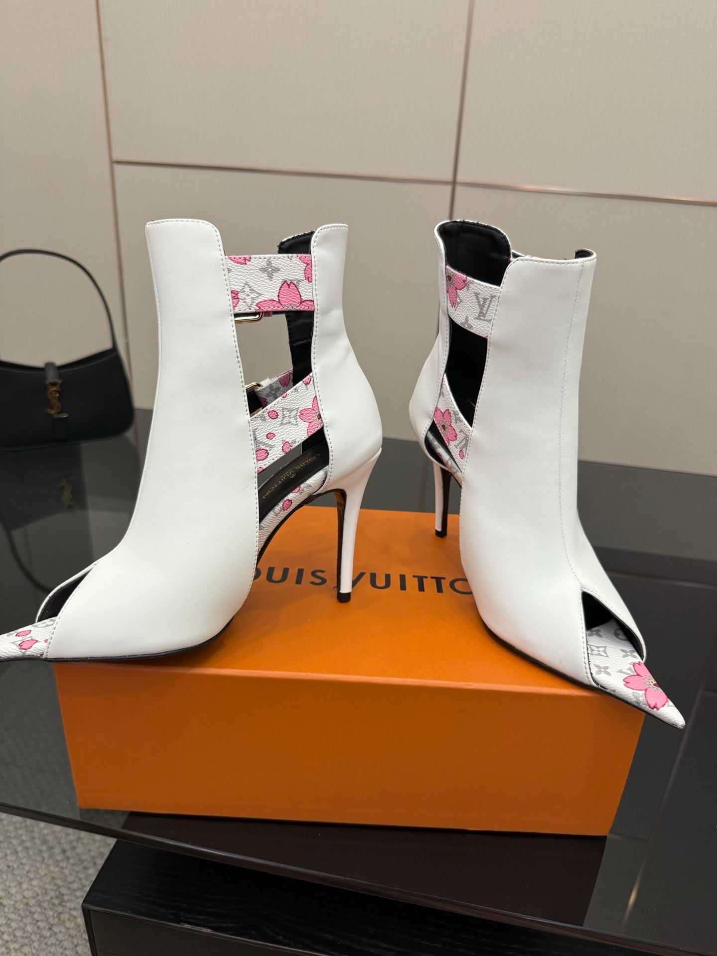 Louis Vuitton women's white ankle boots with floral side panels and stiletto heel