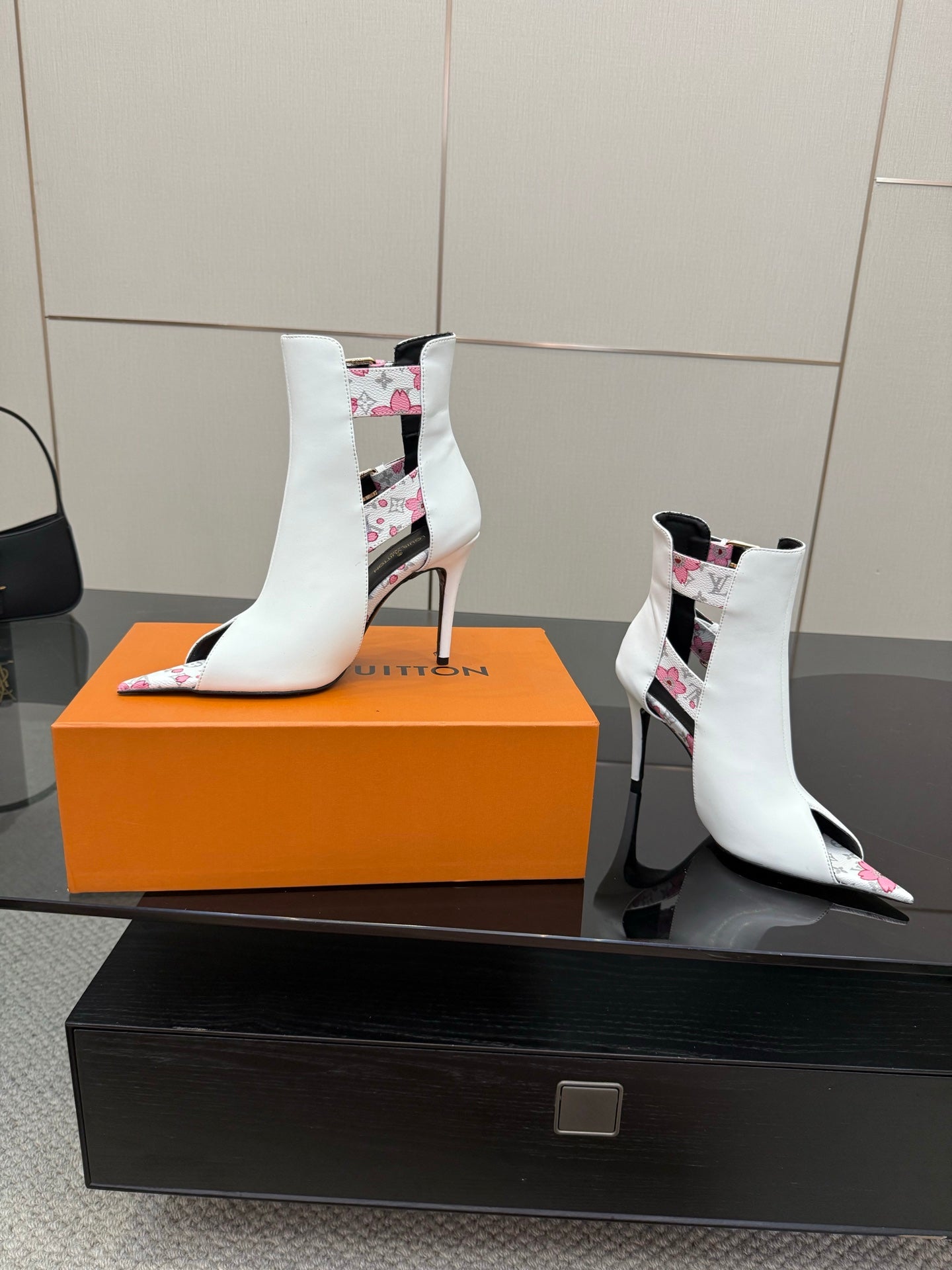 Louis Vuitton women's white ankle boots with floral insets and high stiletto heel