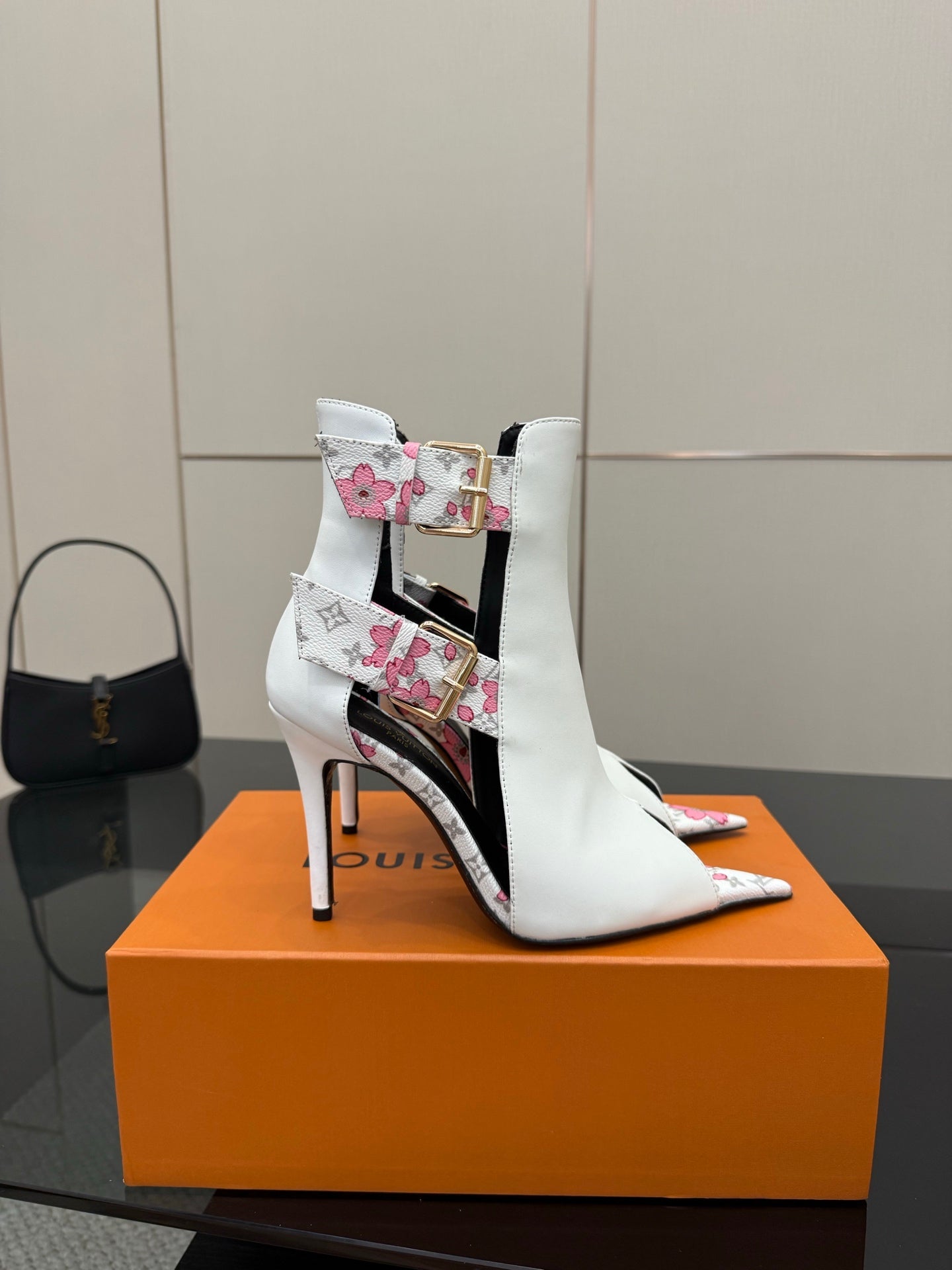 Louis Vuitton women's white ankle boot with floral straps and thin stiletto heel