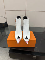 Louis Vuitton women's white ankle boots with floral panel and high stiletto heel