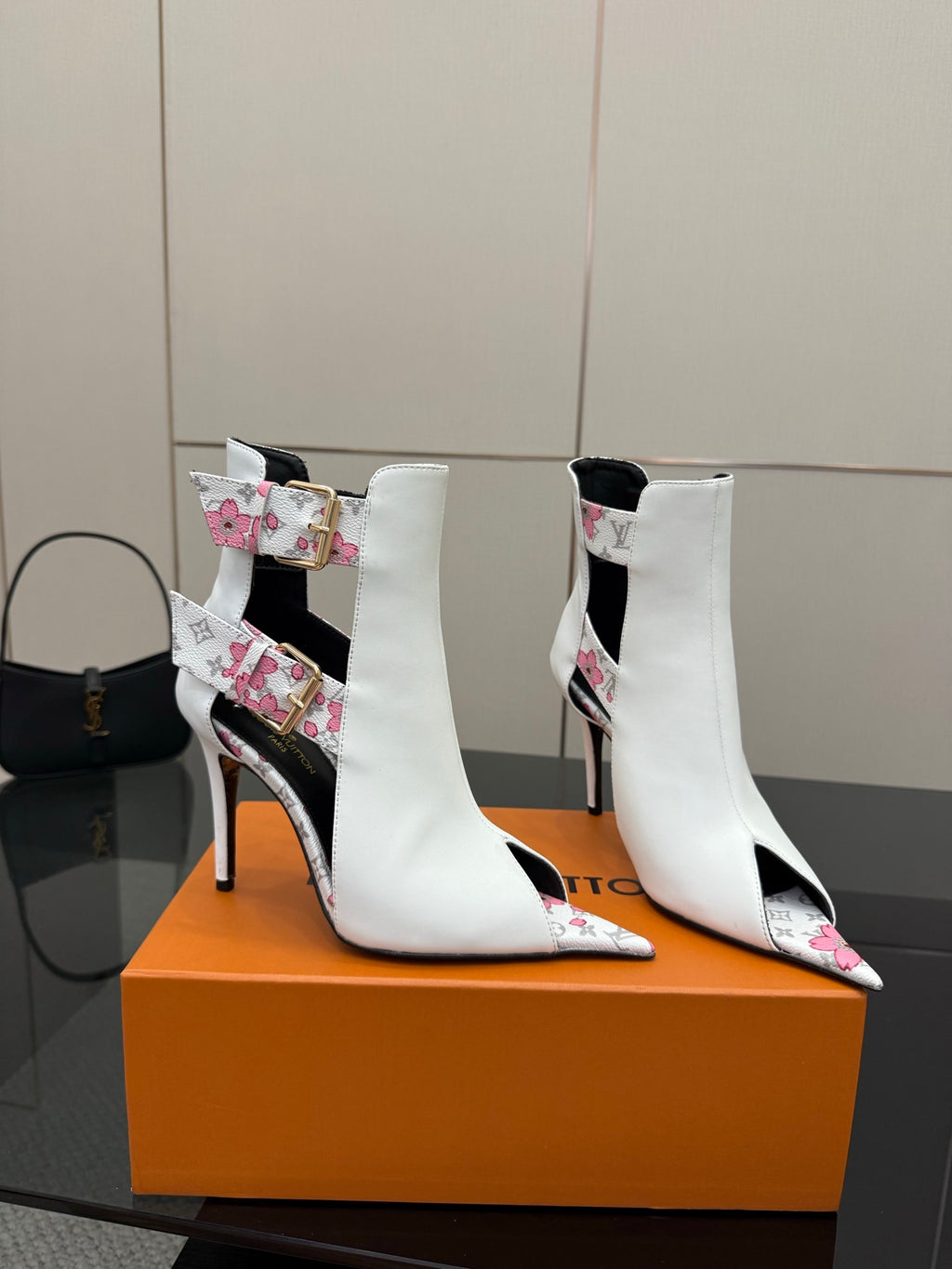 Louis Vuitton women's white ankle boots, floral strap details, pointed toe stiletto heel