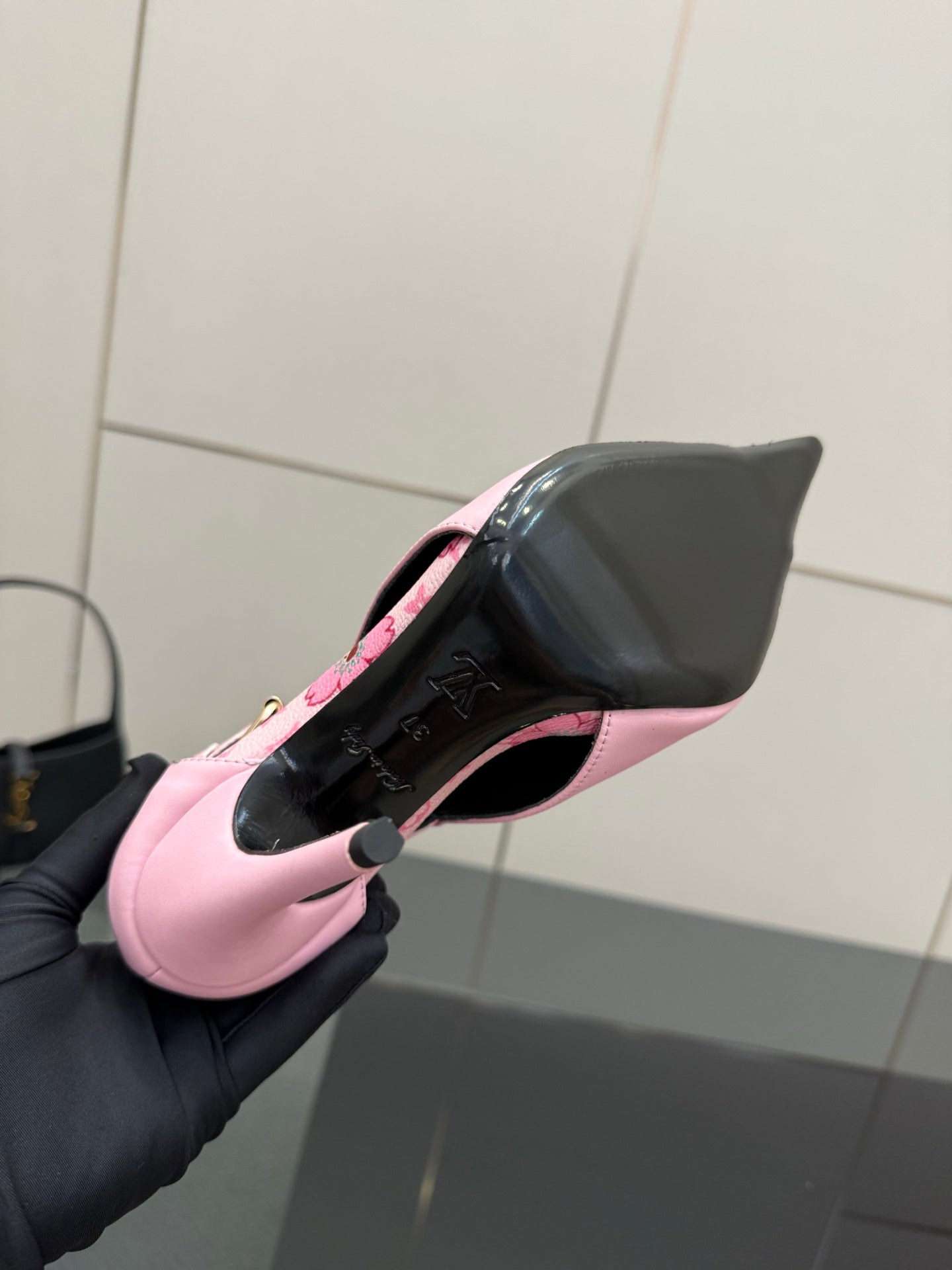 Women's Louis Vuitton pink ankle boot, side view, pointed toe and gold hardware