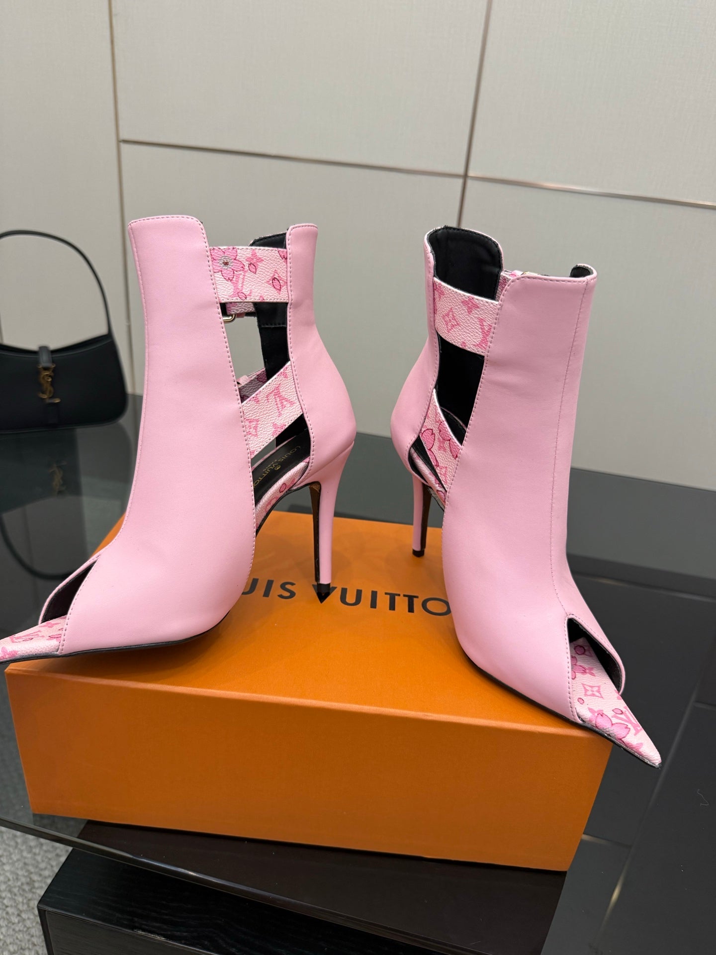 Women's Louis Vuitton pink ankle boots with patterned lining and high stiletto heel