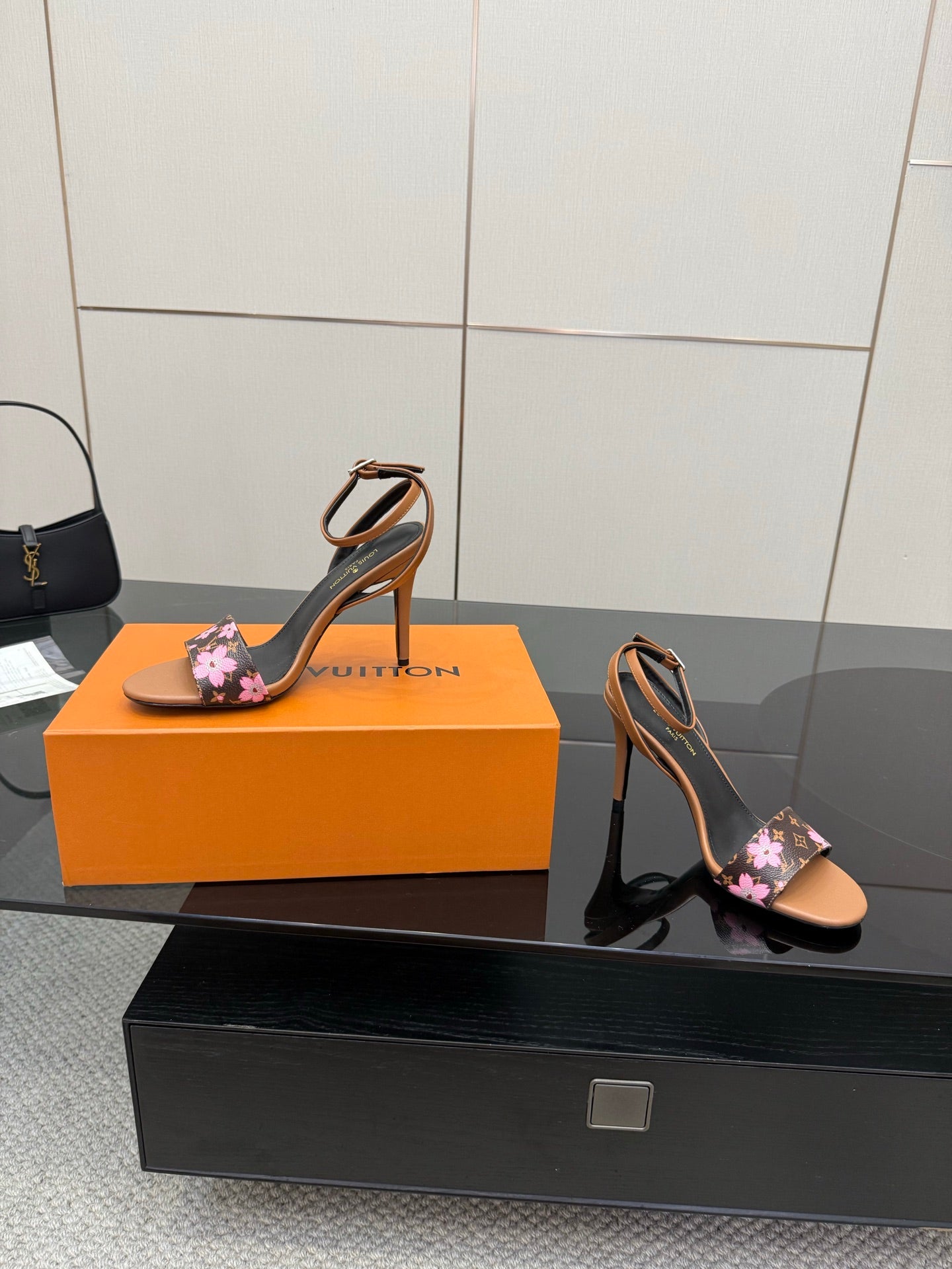 Louis Vuitton slingback sandal with black floral monogram strap and tan block heel