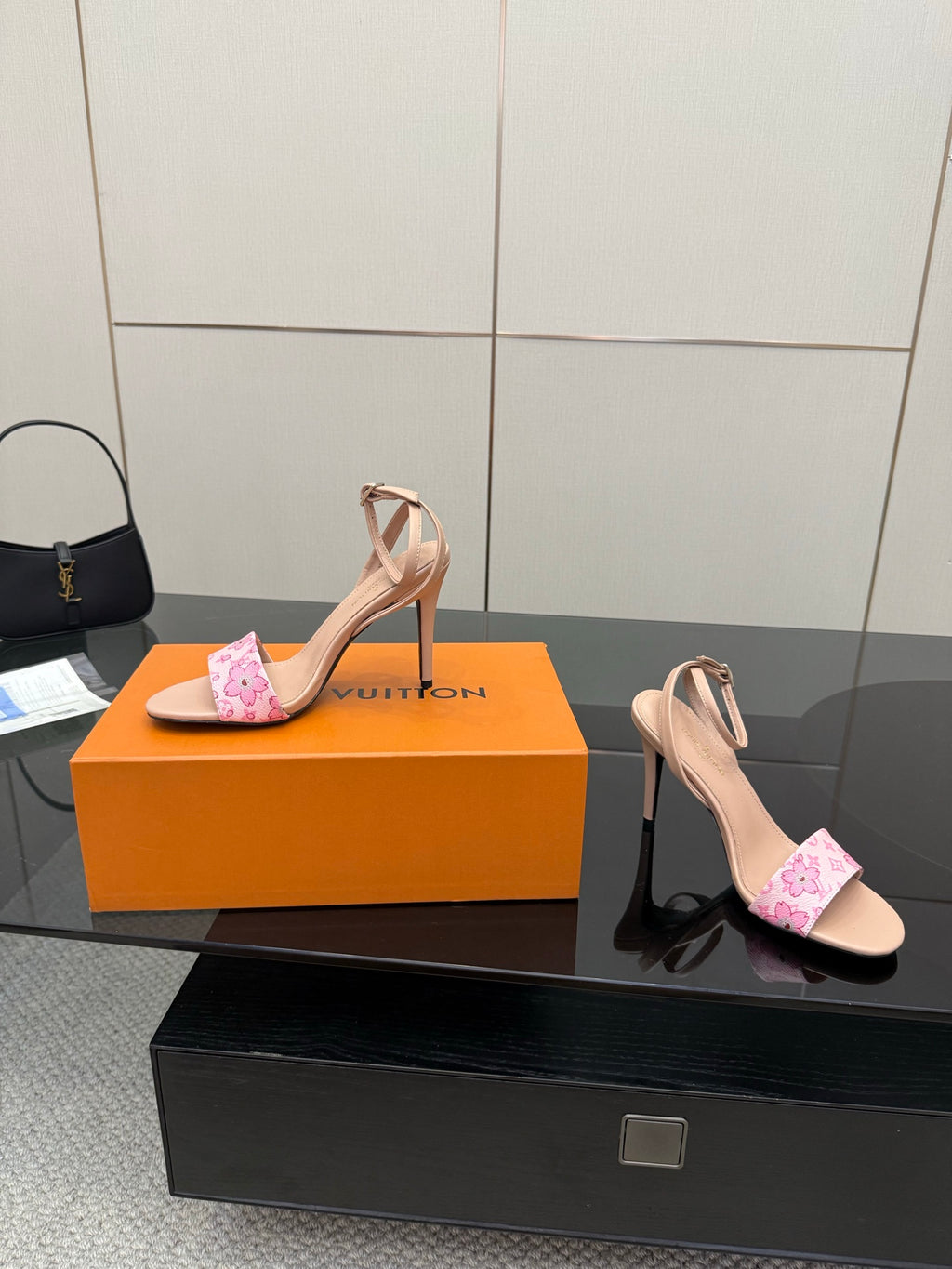 Heeled sandals with pink patterned toe band and nude ankle strap, high stiletto heel