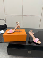 Heeled sandals with pink patterned toe band and nude ankle strap, high stiletto heel