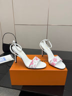 Women's white heeled sandals with pink floral toe panels, slingback ankle strap